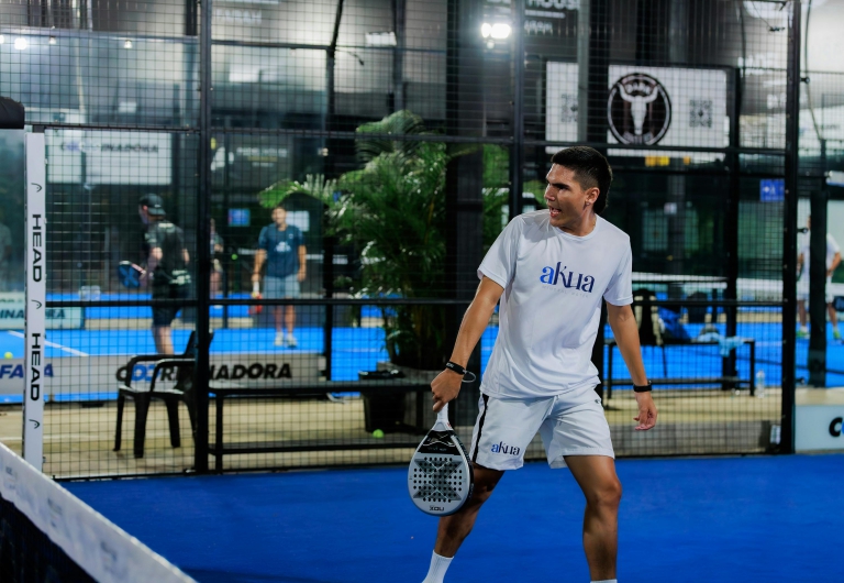 Padel Coach on padel court UK